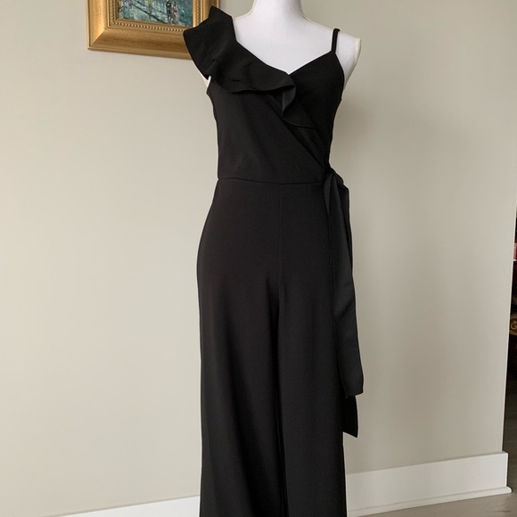 Unique and Classic jumpsuit with side slits - Picture 2 of 10